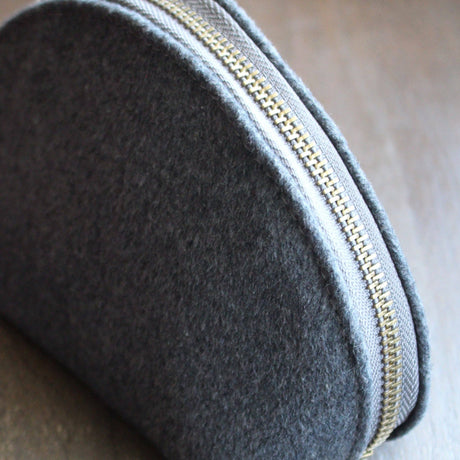 Zippered accessory pouch in wool by NNK Press